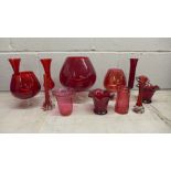 A collection of ruby glass, oversized glasses, vases, etc.