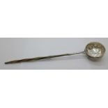 A 19th Century toddy ladle with baleen handle