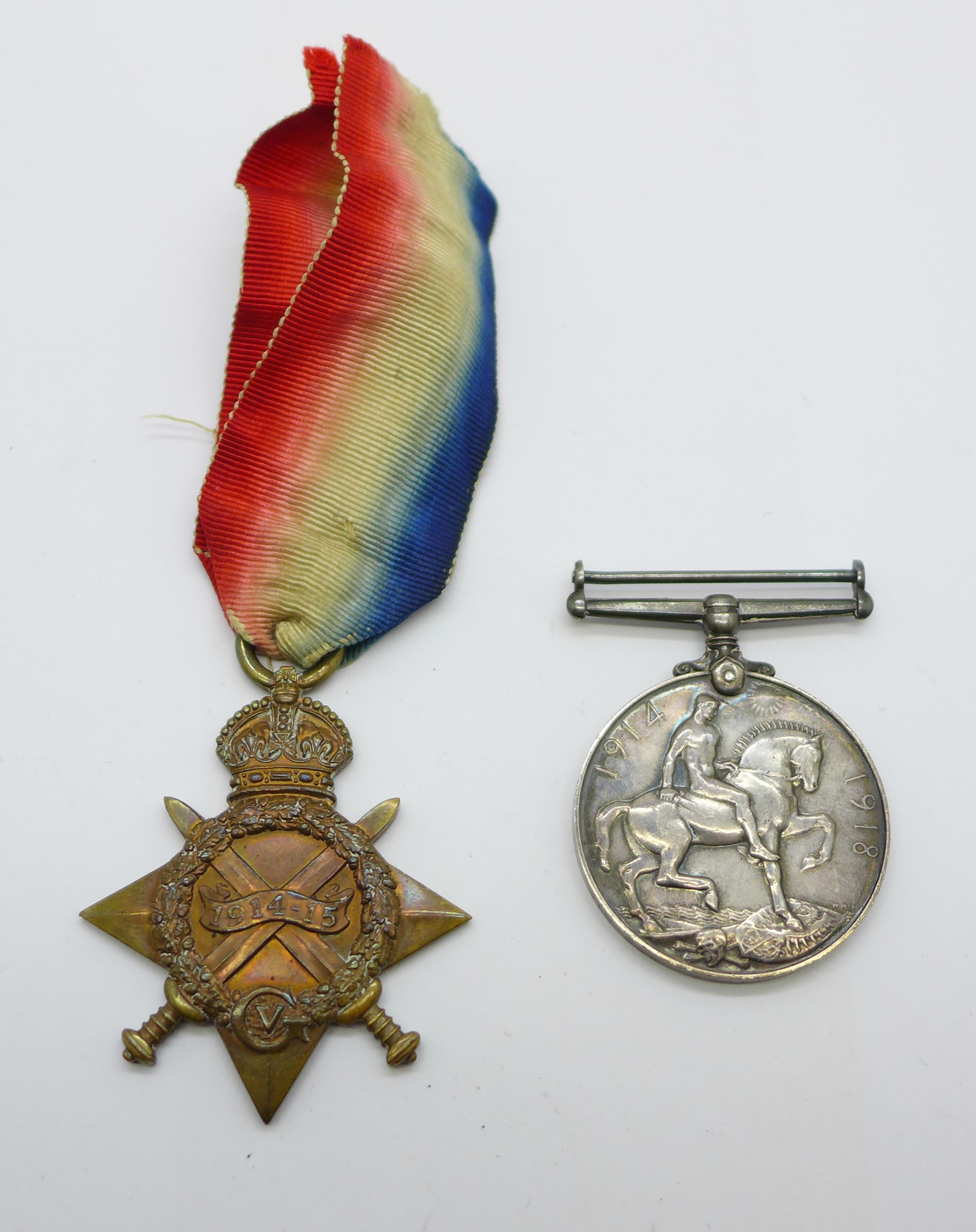 A pair of WWI medals, 14479 to E. Piper Scottish Rifles, the War Medal marked Cpl. and the Star