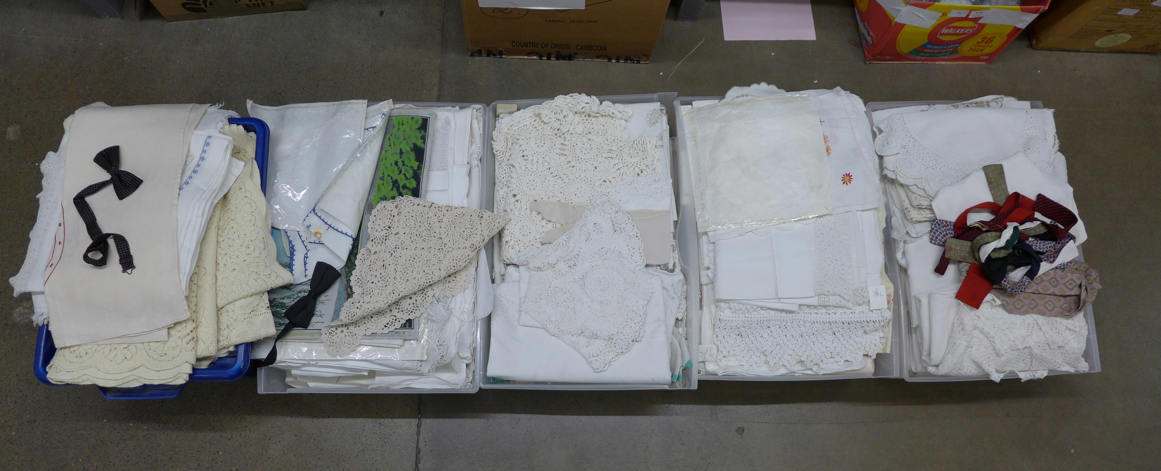 Five boxes of linen and lace edged linens, table cloths, pillow cases, napkins, bed covers, etc.