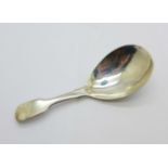 A silver caddy spoon, London 1821