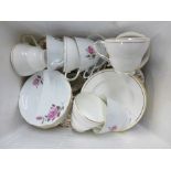 A box of mixed teawares including a Ridgway Persia part dinner service