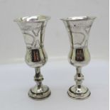 A pair of silver Kiddush cups, London 1924, 60g