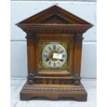 A 19th Century German Junghans oak architectural cased oak mantel clock