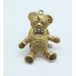 A 9ct Teddy bear pin set with diamond collar, 2.3g