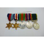Medals including a Territorial medal to 894798 Pte. L. G. Johnstone, King's, possibly re-named