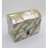 A mother of pearl box with two scent bottles, width 94mm