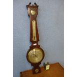 A small brass carriage clock and a 19th Century inlaid mahogany barometer, a/f