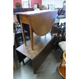 Two George III mahogany drop leaf tables