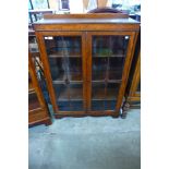 An oak two door bookcase