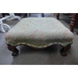 A Victorian mahogany and upholstered footstool