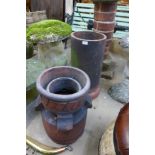 Two terracotta chimney pots