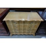 A French oak four drawer commode