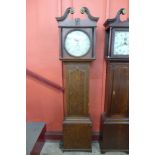 A 19th Century oak 30 hour longcase clock, the painted circular dial signed J. Wainwright,