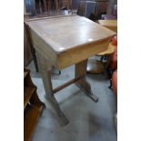 A Victorian pine clerk's desk