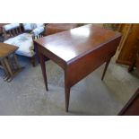 A George III mahogany drop-leaf table