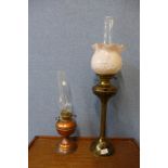 A brass oil lamp and a copper electric lamp