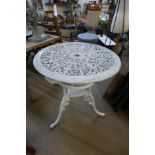 A painted cast alloy garden table