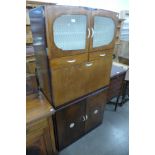 A vintage oak kitchen cabinet