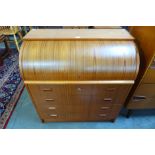 A Swedish SMI teak cylinder top desk, designed by Egon Ostergaard