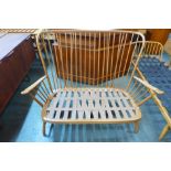 An Ercol Blonde beech Windsor settee