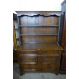 A carved oak dresser