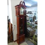 A mahogany triple weight Westminster chime longcase clock