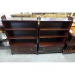 A pair of Stag Minstrel mahogany open bookcases