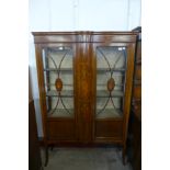 An Edward VII inlaid mahogany display cabinet