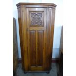 A carved oak hallrobe