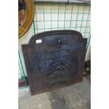 A 19th Century cast iron fire back