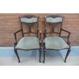 A pair of Edward VII mahogany and fabric upholstered elbow chairs