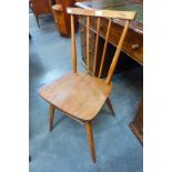 An Ercol Blonde elm and beech 391 model chair