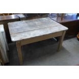 A Victorian pine single drawer kitchen table