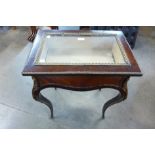 A French Louis XV style rosewood and gilt metal mounted bijouterie table