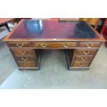 A Victorian oak pedestal library desk