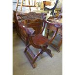 A carved hardwood Savoranola chair