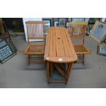 A painted garden table and four chairs