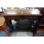 A French style walnut effect two drawer buffet