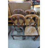 A set of four Victorian mahogany balloon back chairs