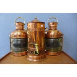 A pair of copper ships lanterns and a water vessel