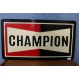 A painted tin Champion advertising sign