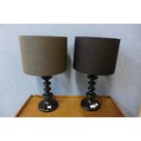 A pair of black perspex table lamps