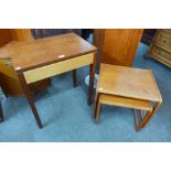 A teak corner cupboard, a teak single drawer side table and a nest of tables