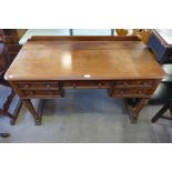 A Victorian mahogany writing table