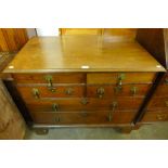 A George II oak chest of drawers