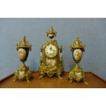 A French gilt metal and cobalt blue porcelain clock garniture