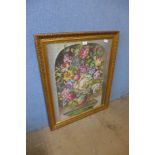 A gilt framed embroidery of flowers in a vase