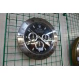 A Rolex style dealers wall clock