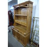 A French style carved pine dresser